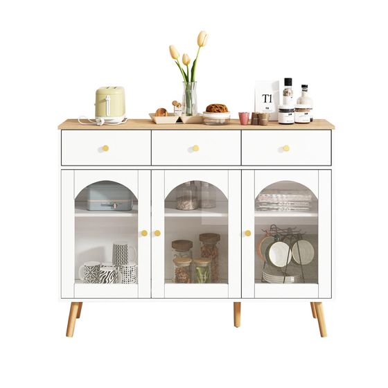 Valkoinen sivupöytä kaarevilla lasiovilla