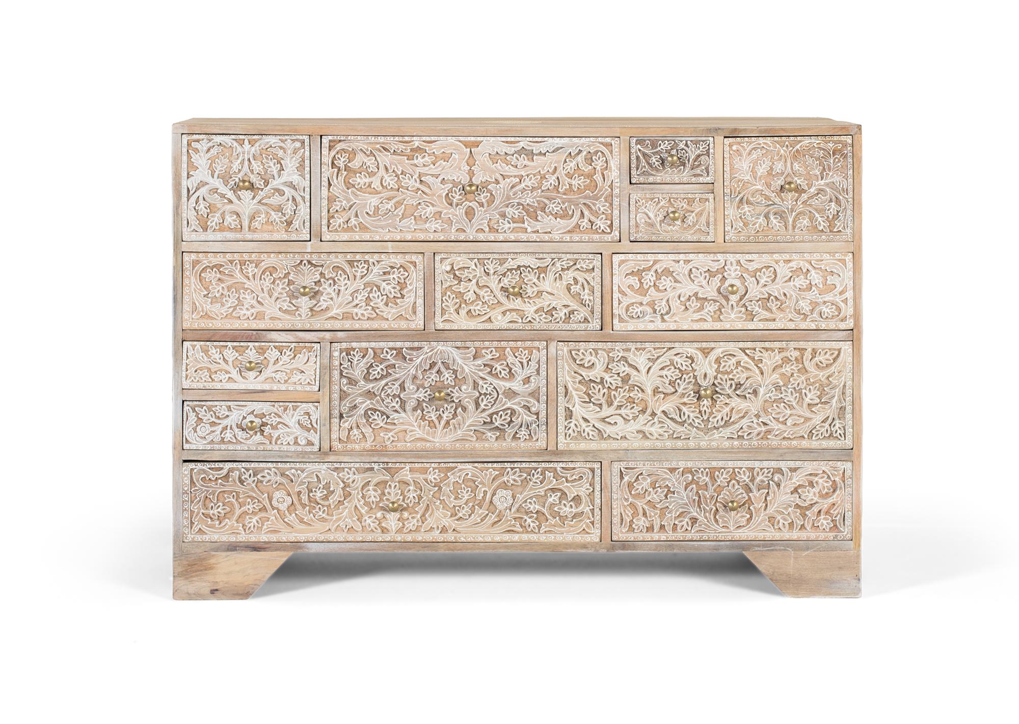 Mangopuusta valmistettu lipasto, jossa 14 käsin veistettyä ja maalattua laatikkoa